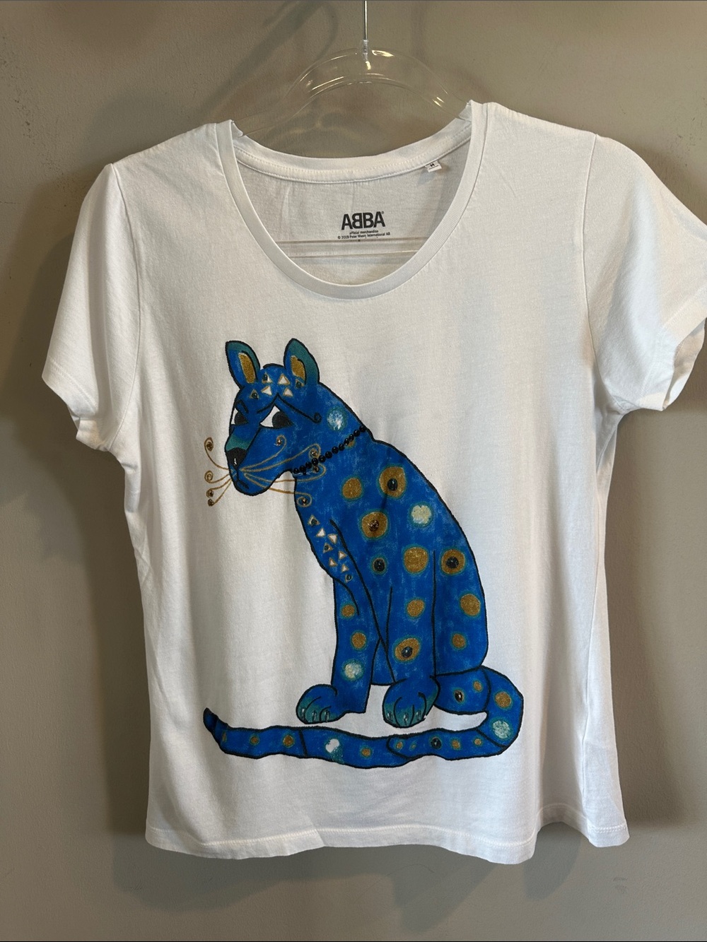 ABBA White T-Shirt with Blue and Gold Panther Illustration